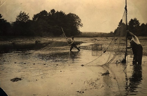 Fishing in the meadows, circa 1920. chs-003544